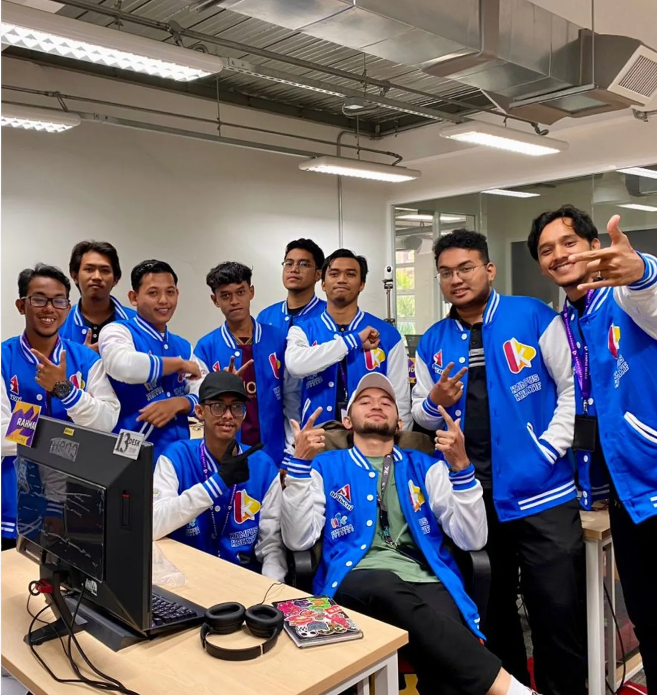 Kampus Kreatif trainees in their programme jackets
